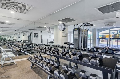 EXPERIENCE ELEVATED LIVING IN THIS HIGHLY FAVORED *H* UNIT AT on Las Vegas Country Club in Nevada - for sale on GolfHomes.com, golf home, golf lot