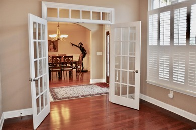 Discover your perfect retreat in this stunning three-bedroom on Mystical Golf Man O War Golf Links in South Carolina - for sale on GolfHomes.com, golf home, golf lot