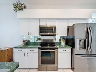 Beautifully well cared for home located in the 55+ gated on Summertree Golf Course in Florida - for sale on GolfHomes.com, golf home, golf lot