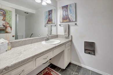 Beautifully located second-floor residence overlooking a on Leisure Village Par 3 Golf Course in California - for sale on GolfHomes.com, golf home, golf lot