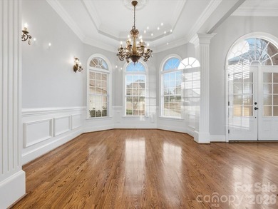 Overlooking the 11th hole of Waterford Golf Club and a tranquil on Waterford Golf Club in South Carolina - for sale on GolfHomes.com, golf home, golf lot