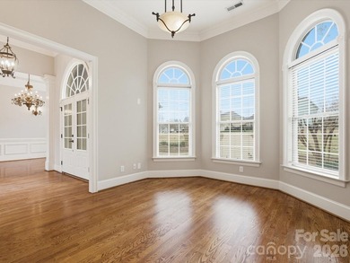 Overlooking the 11th hole of Waterford Golf Club and a tranquil on Waterford Golf Club in South Carolina - for sale on GolfHomes.com, golf home, golf lot