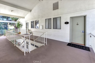 Beautifully located second-floor residence overlooking a on Leisure Village Par 3 Golf Course in California - for sale on GolfHomes.com, golf home, golf lot
