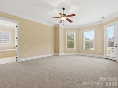 Overlooking the 11th hole of Waterford Golf Club and a tranquil on Waterford Golf Club in South Carolina - for sale on GolfHomes.com, golf home, golf lot