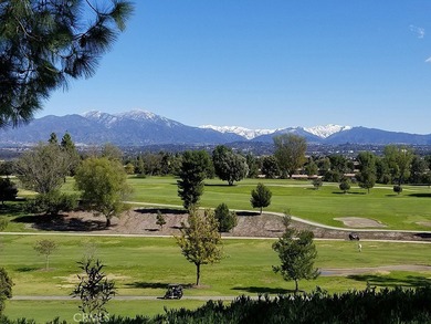 Beautifully located second-floor residence overlooking a on Leisure Village Par 3 Golf Course in California - for sale on GolfHomes.com, golf home, golf lot