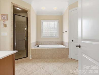 Overlooking the 11th hole of Waterford Golf Club and a tranquil on Waterford Golf Club in South Carolina - for sale on GolfHomes.com, golf home, golf lot