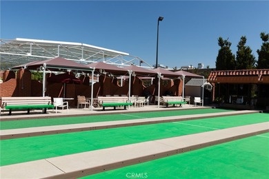 Beautifully located second-floor residence overlooking a on Leisure Village Par 3 Golf Course in California - for sale on GolfHomes.com, golf home, golf lot