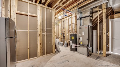 Not yet built & ready for your customization! 1 of 2 Free on Tan-Tar-A Golf Club in Missouri - for sale on GolfHomes.com, golf home, golf lot