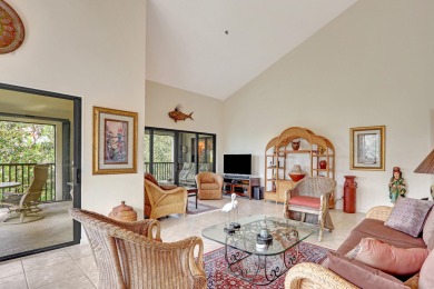 Large corner unit with a spacious screened lanai overlooking a on Jupiter Dunes Golf Course in Florida - for sale on GolfHomes.com, golf home, golf lot