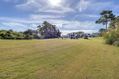 A three-bedroom, two-bathroom townhome located on the par three on South Harbour Golf Links in North Carolina - for sale on GolfHomes.com, golf home, golf lot