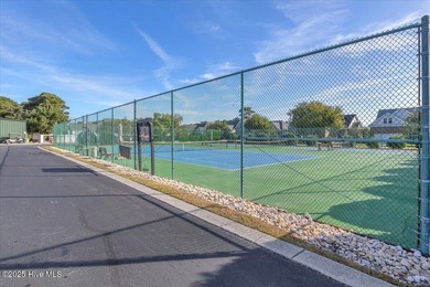 A three-bedroom, two-bathroom townhome located on the par three on South Harbour Golf Links in North Carolina - for sale on GolfHomes.com, golf home, golf lot