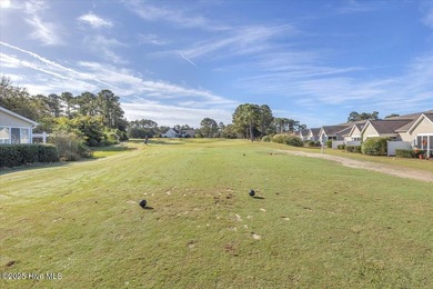 A three-bedroom, two-bathroom townhome located on the par three on South Harbour Golf Links in North Carolina - for sale on GolfHomes.com, golf home, golf lot