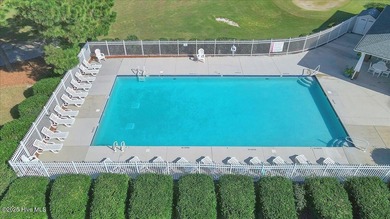 A three-bedroom, two-bathroom townhome located on the par three on South Harbour Golf Links in North Carolina - for sale on GolfHomes.com, golf home, golf lot