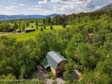 Charming 5-bedroom home located on a peaceful, tree-lined street on Cedar Creek Golf Course in Wyoming - for sale on GolfHomes.com, golf home, golf lot