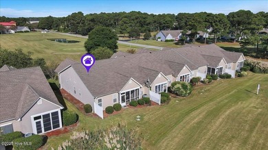 A three-bedroom, two-bathroom townhome located on the par three on South Harbour Golf Links in North Carolina - for sale on GolfHomes.com, golf home, golf lot
