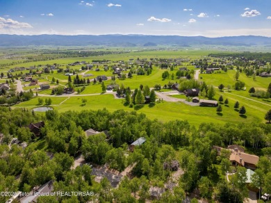 Charming 5-bedroom home located on a peaceful, tree-lined street on Cedar Creek Golf Course in Wyoming - for sale on GolfHomes.com, golf home, golf lot
