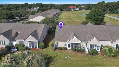 A three-bedroom, two-bathroom townhome located on the par three on South Harbour Golf Links in North Carolina - for sale on GolfHomes.com, golf home, golf lot