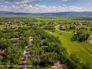 Charming 5-bedroom home located on a peaceful, tree-lined street on Cedar Creek Golf Course in Wyoming - for sale on GolfHomes.com, golf home, golf lot