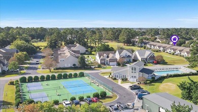 A three-bedroom, two-bathroom townhome located on the par three on South Harbour Golf Links in North Carolina - for sale on GolfHomes.com, golf home, golf lot