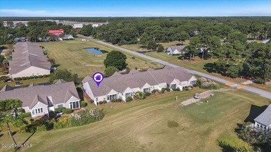A three-bedroom, two-bathroom townhome located on the par three on South Harbour Golf Links in North Carolina - for sale on GolfHomes.com, golf home, golf lot