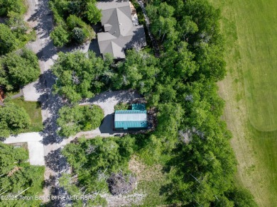 Charming 5-bedroom home located on a peaceful, tree-lined street on Cedar Creek Golf Course in Wyoming - for sale on GolfHomes.com, golf home, golf lot