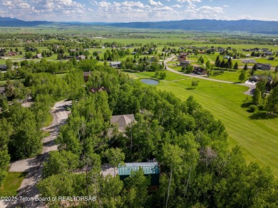 Charming 5-bedroom home located on a peaceful, tree-lined street on Cedar Creek Golf Course in Wyoming - for sale on GolfHomes.com, golf home, golf lot