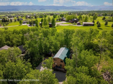 Charming 5-bedroom home located on a peaceful, tree-lined street on Cedar Creek Golf Course in Wyoming - for sale on GolfHomes.com, golf home, golf lot