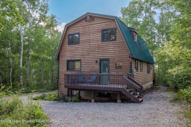 Charming 5-bedroom home located on a peaceful, tree-lined street on Cedar Creek Golf Course in Wyoming - for sale on GolfHomes.com, golf home, golf lot