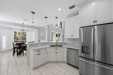 Thoughtfully updated POOL HOME designed for indoor-outdoor on Golf Club At South Hampton in Florida - for sale on GolfHomes.com, golf home, golf lot