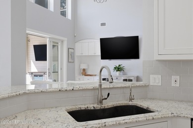 Thoughtfully updated POOL HOME designed for indoor-outdoor on Golf Club At South Hampton in Florida - for sale on GolfHomes.com, golf home, golf lot