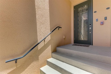 Welcome to 10788 Tarflower Drive! This exceptional second-floor on Sarasota National Golf Club in Florida - for sale on GolfHomes.com, golf home, golf lot