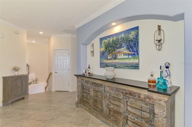 Welcome to 10788 Tarflower Drive! This exceptional second-floor on Sarasota National Golf Club in Florida - for sale on GolfHomes.com, golf home, golf lot