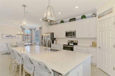 Welcome to 10788 Tarflower Drive! This exceptional second-floor on Sarasota National Golf Club in Florida - for sale on GolfHomes.com, golf home, golf lot
