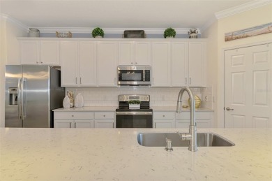 Welcome to 10788 Tarflower Drive! This exceptional second-floor on Sarasota National Golf Club in Florida - for sale on GolfHomes.com, golf home, golf lot