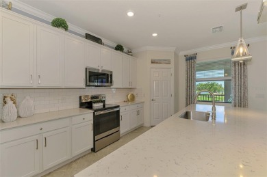 Welcome to 10788 Tarflower Drive! This exceptional second-floor on Sarasota National Golf Club in Florida - for sale on GolfHomes.com, golf home, golf lot