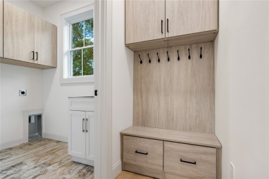 A showcase of impeccable craftsmanship, this new construction on Brookstone Meadows Golf Course in South Carolina - for sale on GolfHomes.com, golf home, golf lot