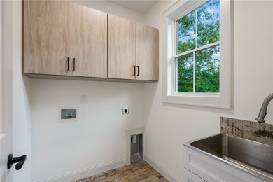 A showcase of impeccable craftsmanship, this new construction on Brookstone Meadows Golf Course in South Carolina - for sale on GolfHomes.com, golf home, golf lot