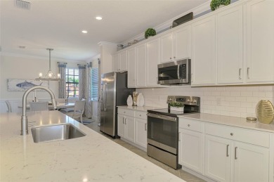Welcome to 10788 Tarflower Drive! This exceptional second-floor on Sarasota National Golf Club in Florida - for sale on GolfHomes.com, golf home, golf lot