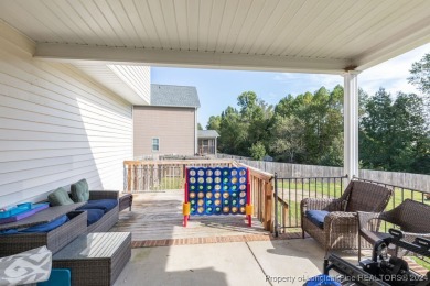 This beautiful three-story, 4-bedroom, 3-bath home in Raeford on Bayonet At Puppy Creek Golf Club in North Carolina - for sale on GolfHomes.com, golf home, golf lot