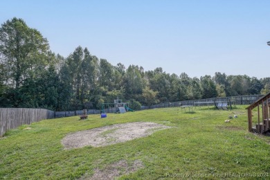 This beautiful three-story, 4-bedroom, 3-bath home in Raeford on Bayonet At Puppy Creek Golf Club in North Carolina - for sale on GolfHomes.com, golf home, golf lot