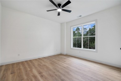 A showcase of impeccable craftsmanship, this new construction on Brookstone Meadows Golf Course in South Carolina - for sale on GolfHomes.com, golf home, golf lot