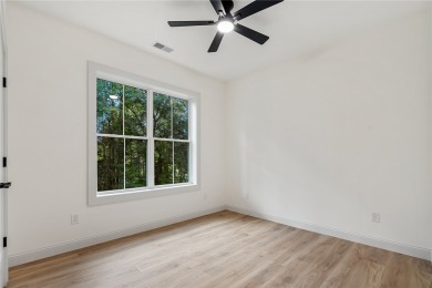 A showcase of impeccable craftsmanship, this new construction on Brookstone Meadows Golf Course in South Carolina - for sale on GolfHomes.com, golf home, golf lot