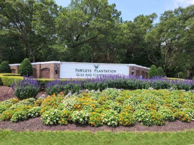 Very unique ownership opportunity for a first floor condo in on Pawleys Plantation Golf and Country Club in South Carolina - for sale on GolfHomes.com, golf home, golf lot