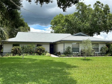Nestled on a tree-shaded lot on a quiet cul-de-sac street, this on Cypresswood Golf and Country Club in Florida - for sale on GolfHomes.com, golf home, golf lot