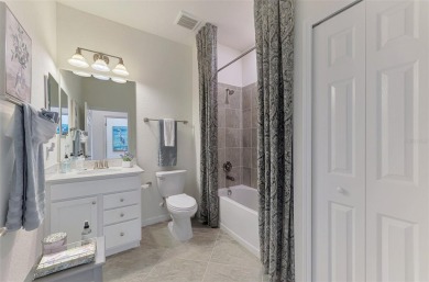 Welcome to 10788 Tarflower Drive! This exceptional second-floor on Sarasota National Golf Club in Florida - for sale on GolfHomes.com, golf home, golf lot