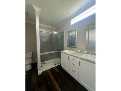 This New Palm Harbor Carriage Farmhouse home is 1500 Sq Ft and on Scotland Yards Golf Club in Florida - for sale on GolfHomes.com, golf home, golf lot