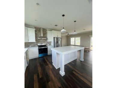 This New Palm Harbor Carriage Farmhouse home is 1500 Sq Ft and on Scotland Yards Golf Club in Florida - for sale on GolfHomes.com, golf home, golf lot