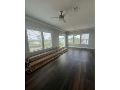 This New Palm Harbor Carriage Farmhouse home is 1500 Sq Ft and on Scotland Yards Golf Club in Florida - for sale on GolfHomes.com, golf home, golf lot