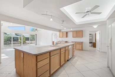 This home is perfectly situated minutes from golf, shopping, and on Stardust Golf Course in Arizona - for sale on GolfHomes.com, golf home, golf lot