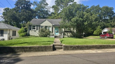 This 3-bedroom, 2-bath home sits on a spacious corner lot just on Duncan Park Golf Course in Mississippi - for sale on GolfHomes.com, golf home, golf lot